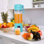 Portable USB rechargeable juicer/blender with 6 powerful blades, ideal for making smoothies, shakes, and juices on the go
